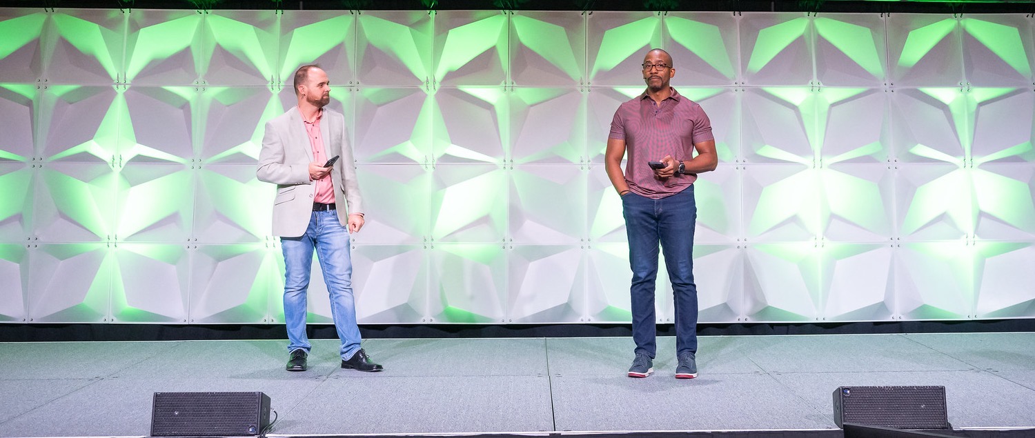 Johnny and his co-host on the GopherCon 2026 main stage